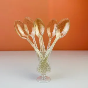 Cuillères transparentes décorées or