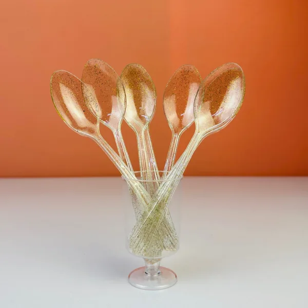 Cuillères transparentes décorées or
